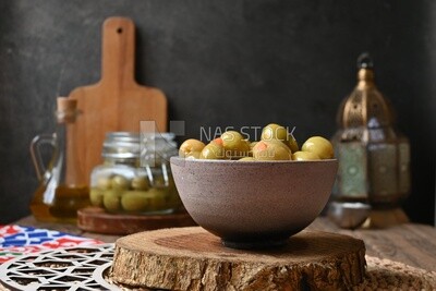 Bowl of Pickled green olives, Egyptian pickles, Arab restaurants
