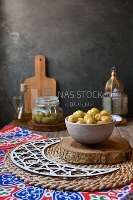 Bowl of Pickled green olives, Egyptian pickles, Arab restaurants