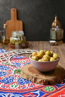 Bowl of Pickled green olives, Egyptian pickles, Arab restaurants