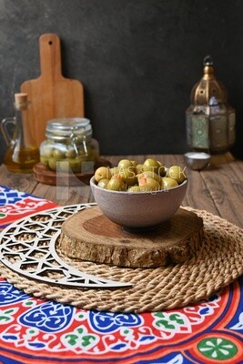Bowl of Pickled green olives, Egyptian pickles, Arab restaurants