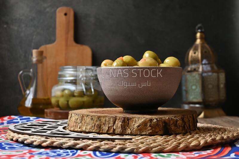 Bowl of Pickled green olives, Egyptian pickles, Arab restaurants