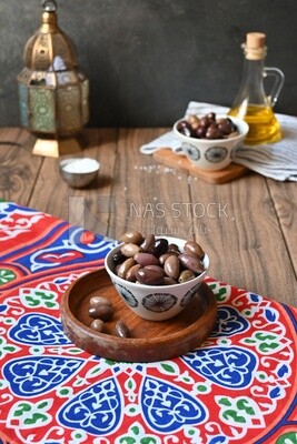 Bowl of Pickled black olives, Egyptian pickles, Arab restaurants