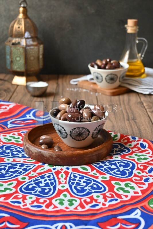 Bowl of Pickled black olives, Egyptian pickles, Arab restaurants
