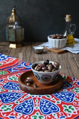 Bowl of Pickled black olives, Egyptian pickles, Arab restaurants