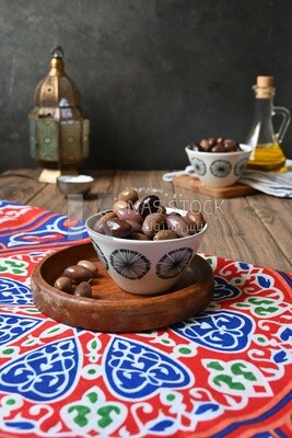 Bowl of Pickled black olives, Egyptian pickles, Arab restaurants