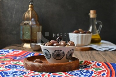 Bowl of Pickled black olives, Egyptian pickles, Arab restaurants