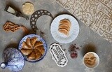 Plate of Qatayef with nuts, oriental Arabic sweets, Ramadan sweets