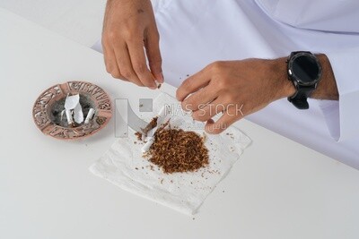 Saudi man fights against the smoking habit, tobacco addiction, cigarette addiction, harmful and toxic substance abuse, harmful behavioral habits, no smoking, Saudi model