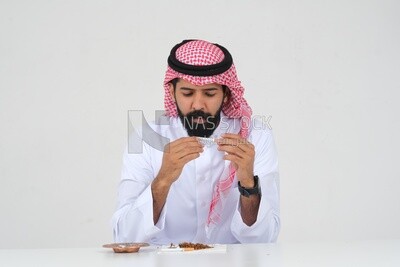 Saudi man fights against the smoking habit, tobacco addiction, cigarette addiction, harmful and toxic substance abuse, harmful behavioral habits, no smoking, Saudi model