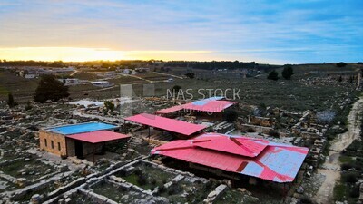 Drone footage shows an overview of buildings with trees in Libya, Libya, history of Libya, landmarks in Libya