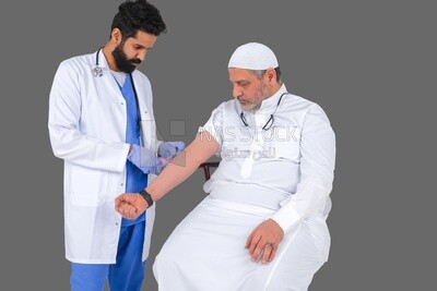 Saudi man wear medical coats and gloves and give Saudi patient injections, the concept of medicine and health care, and receive vaccinations in health centers, Saudi model