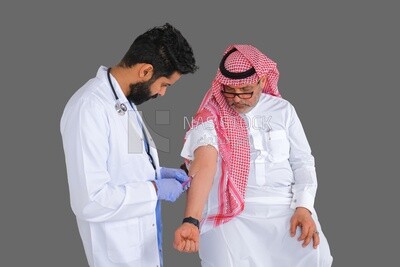 Saudi man wear medical coats and gloves and give Saudi patient injections, the concept of medicine and health care, and receive vaccinations in health centers, Saudi model