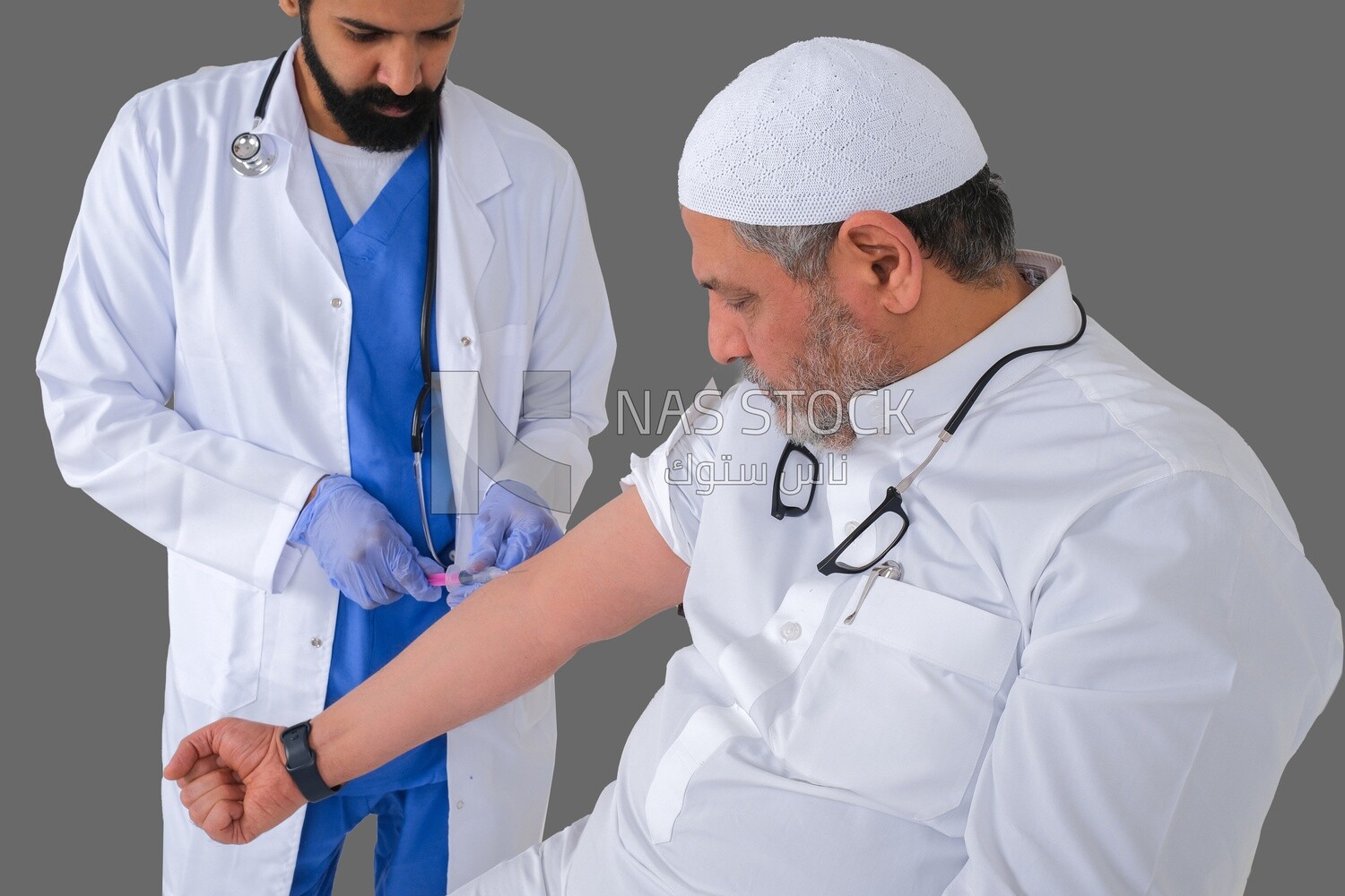 Saudi man wear medical coats and gloves and give Saudi patient injections, the concept of medicine and health care, and receive vaccinations in health centers, Saudi model
