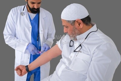 Saudi man wear medical coats and gloves and give Saudi patient injections, the concept of medicine and health care, and receive vaccinations in health centers, Saudi model