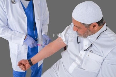 Saudi man wear medical coats and gloves and give Saudi patient injections, the concept of medicine and health care, and receive vaccinations in health centers, Saudi model