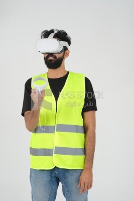 Saudi engineer wearing a safety vest, use the VR of 3D hologram technology, engineering professions and jobs, white background, Saudi model