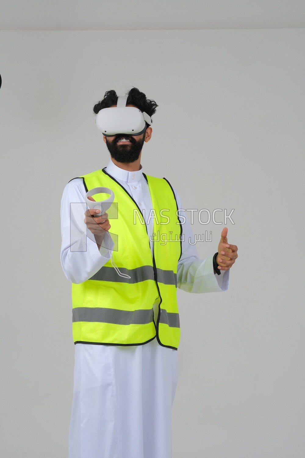Saudi engineer wearing a safety vest, use the VR of 3D hologram technology, engineering professions and jobs, white background, Saudi model