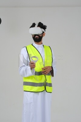 Saudi engineer wearing a safety vest, use the VR of 3D hologram technology, engineering professions and jobs, white background, Saudi model