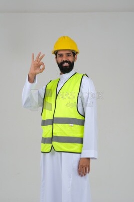 Saudi engineer wearing a work hat and safety vest, engineering professions and jobs, white background, Saudi model