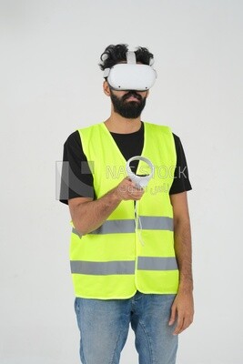 Saudi engineer wearing a safety vest, use the VR of 3D hologram technology, engineering professions and jobs, white background, Saudi model