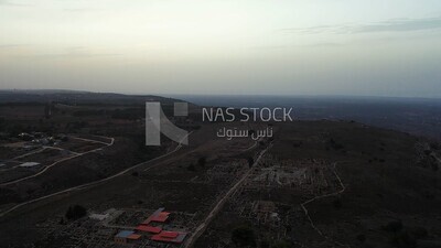 Drone footage shows an overview of buildings with trees in Libya, Libya, history of Libya, landmarks in Libya