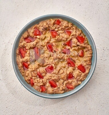 Close-up of oriental breakfast, a dish of foul medames with tomato, Arabic breakfast, arab restaurant