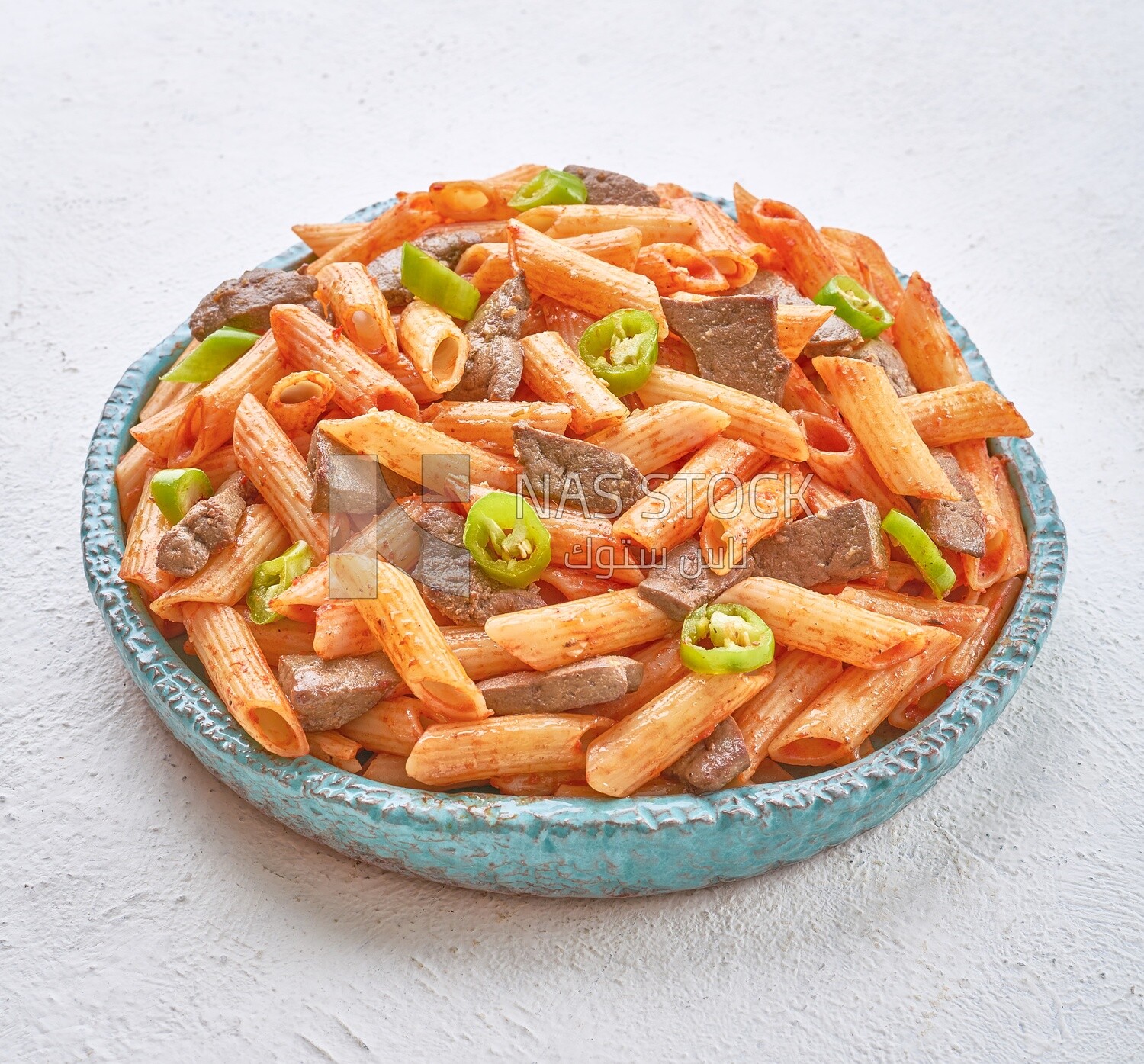 Side view of a pasta with liver