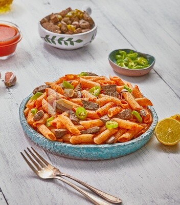 Dining table with liver pasta and appetizers