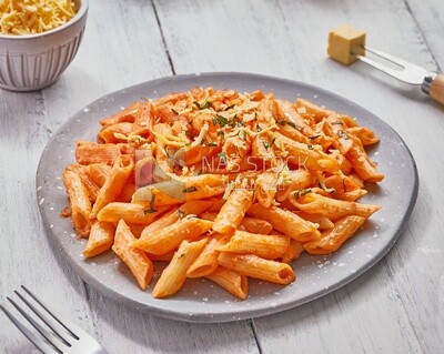 Plate of pasta with red sauce
