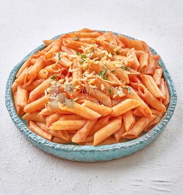 Plate of pasta with red sauce in a solid background