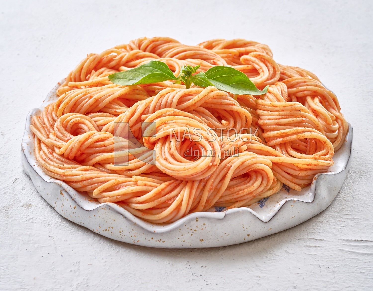 Spaghetti pasta in a solid background