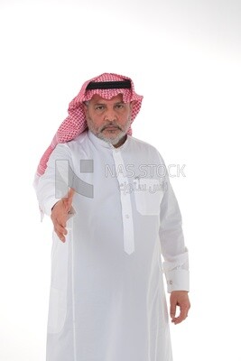 Saudi man in traditional Saudi dress gesturing with handshake gesture, welcome, agreement, peace, acquaintance, dating concept, white background