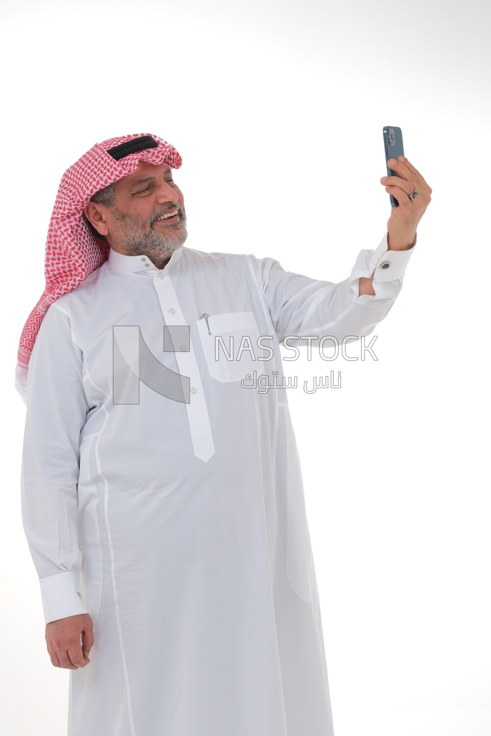 old saudi man using a mobile phone, communicating with individuals, online requests and marketing, social relations, using technical devices, white background