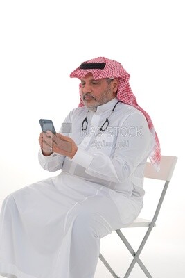 old saudi man using a mobile phone, communicating with individuals, online requests and marketing, social relations, using technical devices, white background