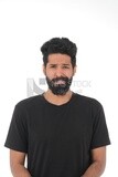 close-up of a Saudi man looking angry, wearing casual clothes, carrying his mobile phone, Saudi model, white background