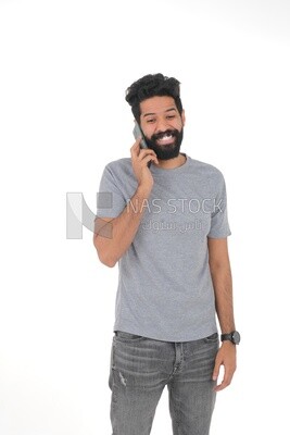 saudi man using a mobile phone, communicating with individuals, online requests and marketing, social relations, using technical devices, white background
