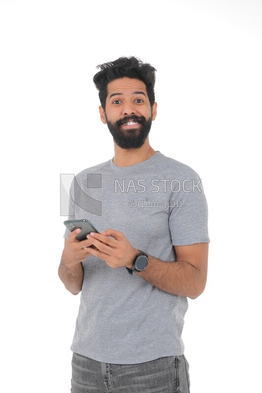 saudi man using a mobile phone, communicating with individuals, online requests and marketing, social relations, using technical devices, white background