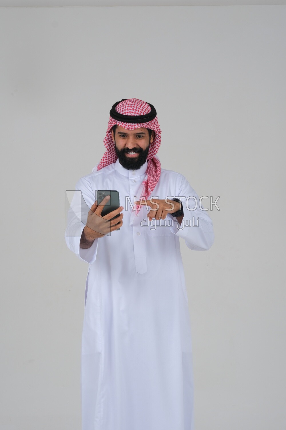 saudi man using a mobile phone, communicating with individuals, online requests and marketing, social relations, using technical devices, white background