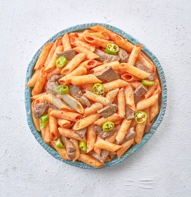 Pasta with liver and hot pepper in a solid background