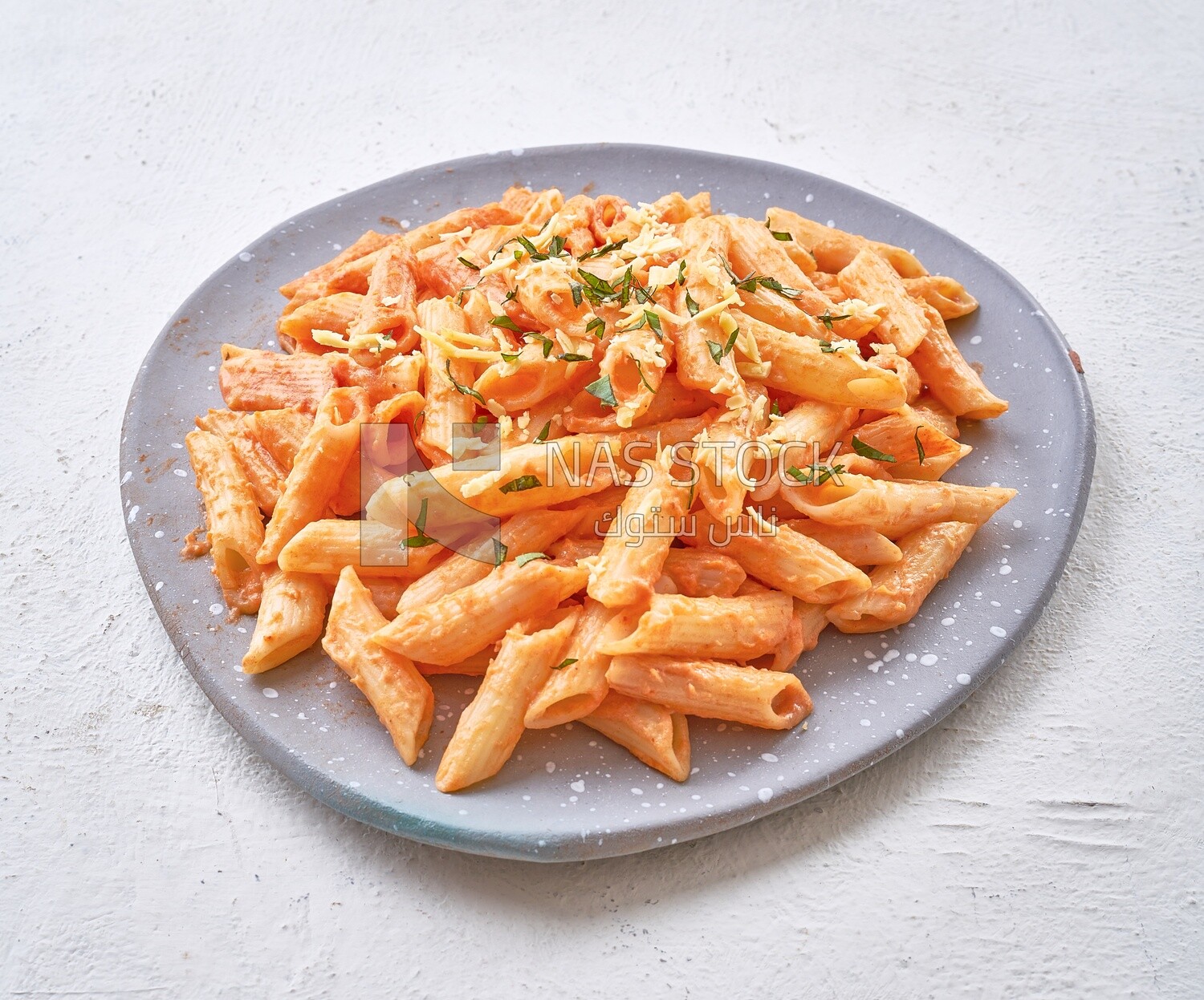 Pasta with grated cheese and parsley