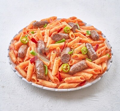 Pasta with sausage in a solid background