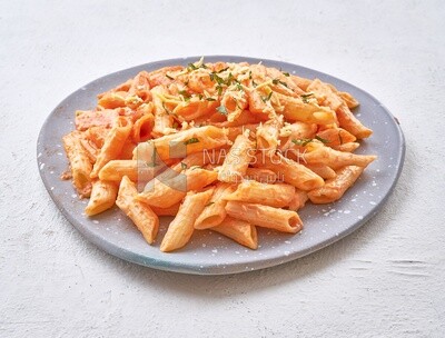 Plate of pasta in red sauce with grated cheese