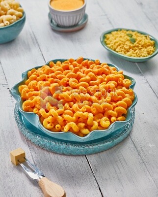 Top view of a plate of pasta and cheese