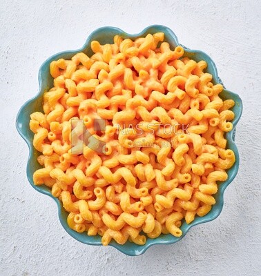 Pasta and cheese on a solid background
