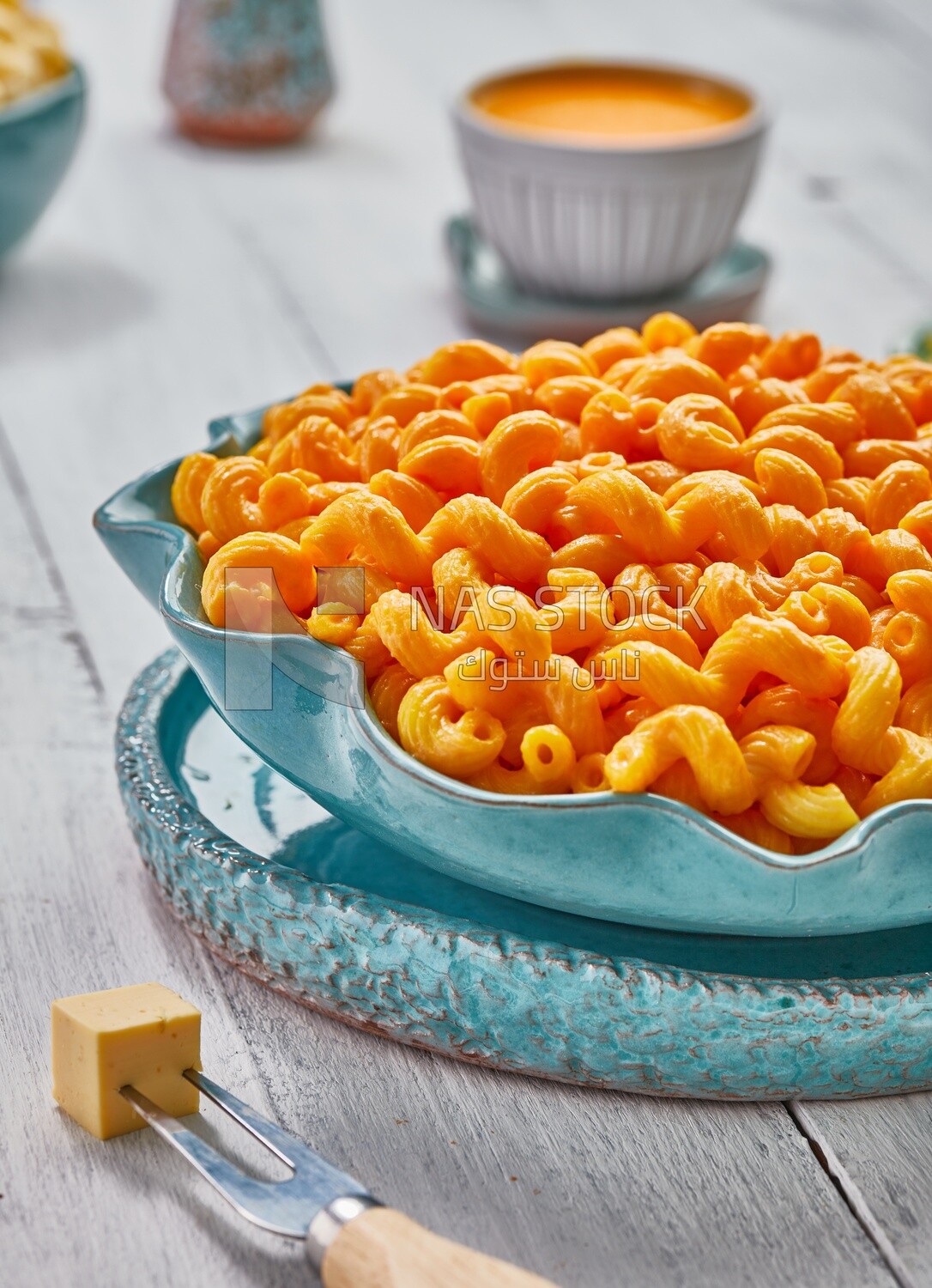 Side view of a plate of pasta and cheese