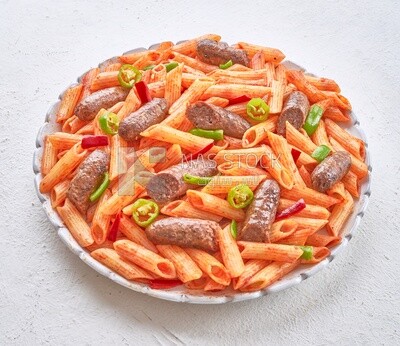 Top view of a pasta with sausage