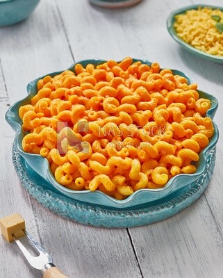 Top view of a plate of pasta and cheese