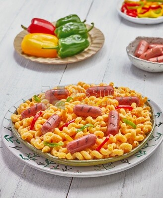 plate of pasta with sausage