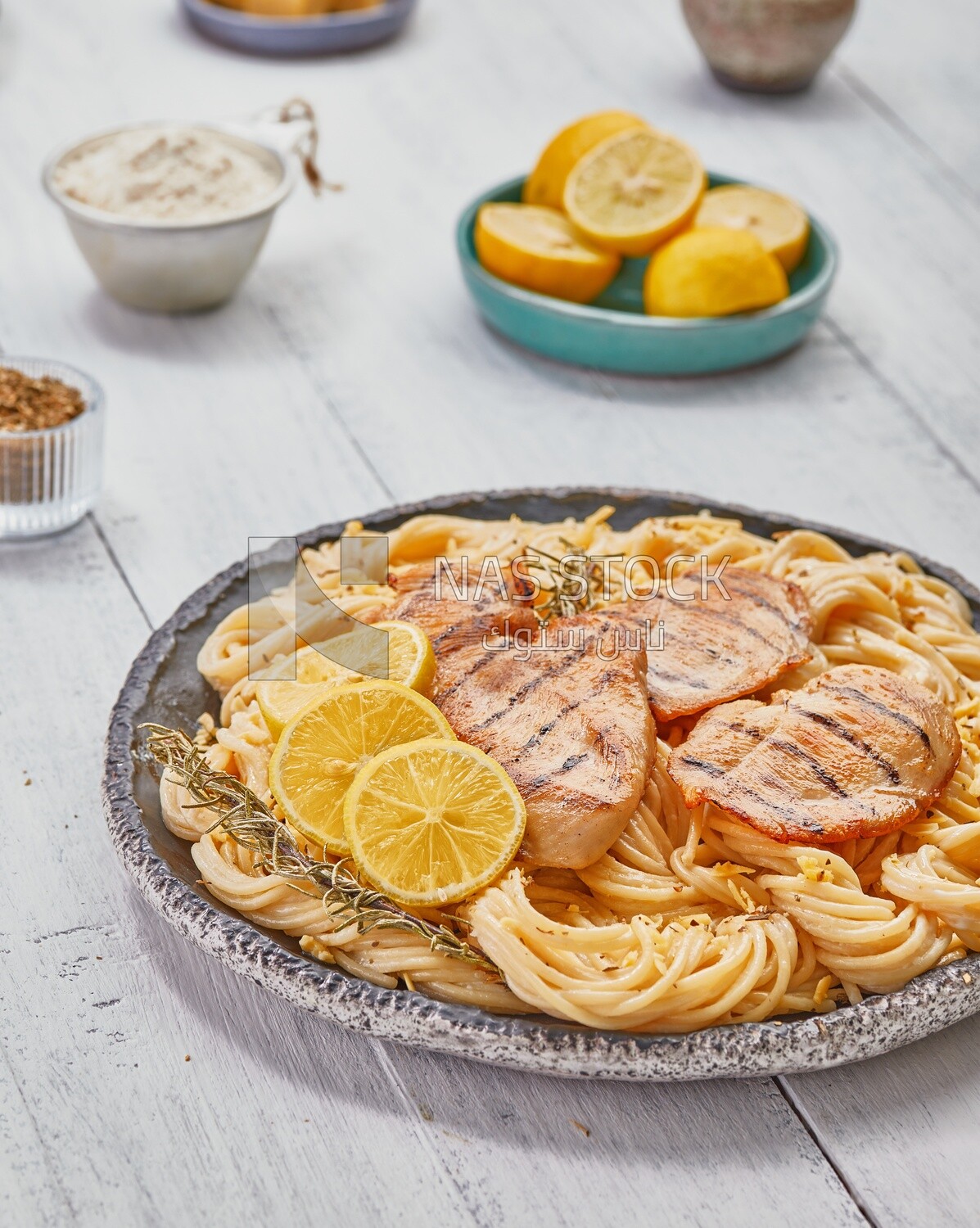 Dining table With a plate of spaghetti  with chicken