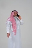 elderly Saudi man using a mobile phone, communicating with individuals, online requests and marketing, social relations, using technical devices, white background